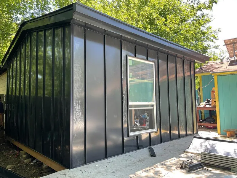 Black standing seam metal wall panels for Roof Inspection in Sidney